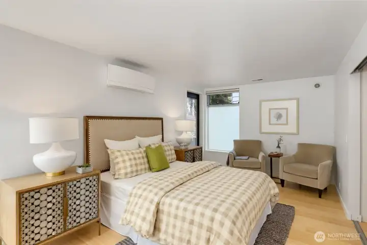 Generous second floor bedroom with large closet and access to back deck