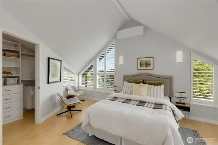 Wake up to beautiful sunrises and mountain views from this second third-floor bedroom. It features large spaces, loads of light and a walk-in closet while recently installed air conditioning keeps the room comfortable all summer long