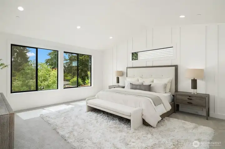 Designer primary suite with five-piece bath with heated floors