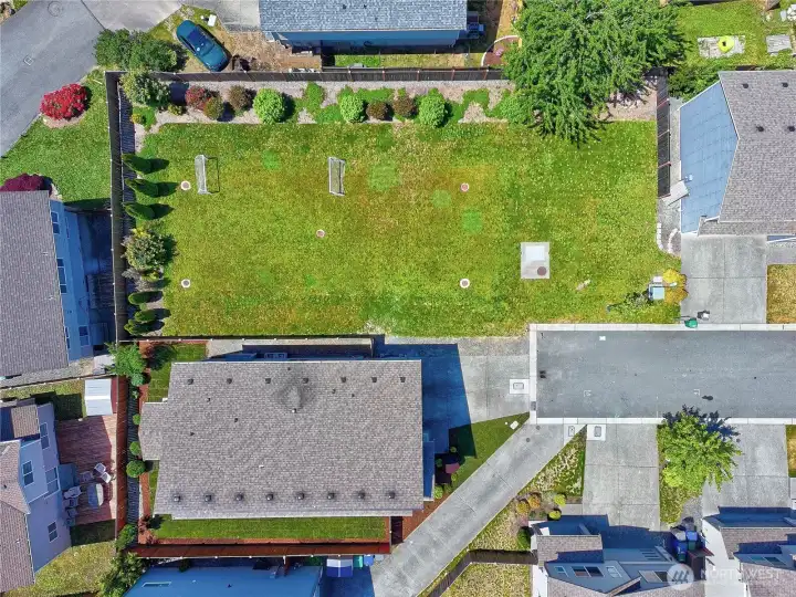 home adjacent to community play area
