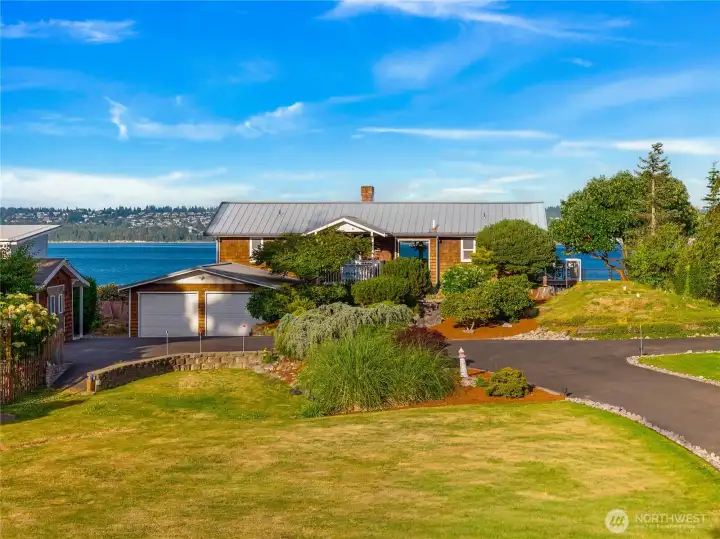 This beautiful northwest home has just about everything you could want. The large lot will get your imagination going. Do I want to build a shop? What about a pickelball court? Let your thought wander and make this beauty yours.