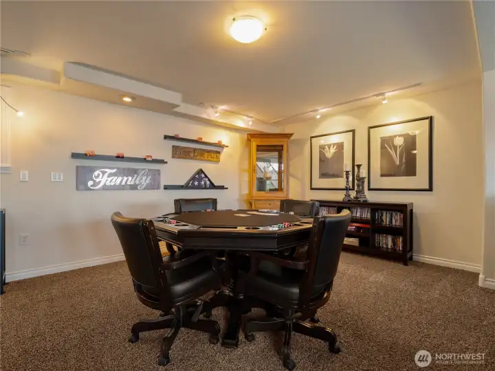 How about a game of cards? Or maybe this is where the pool or ping pong table goes? You deside.