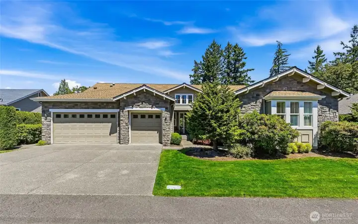 Three car garage and plenty of driveway parking for guests.