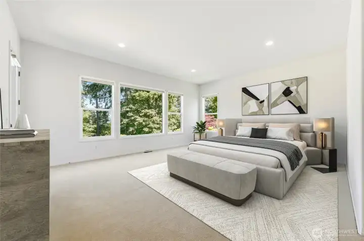 Enormous primary bedroom that looks out to the views. Virtually staged.