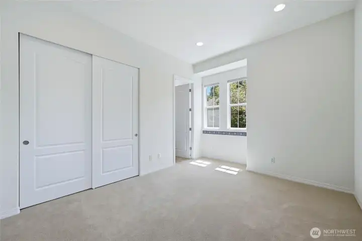 Third bedroom has a private full bath.