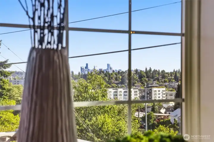 Peek-a-boo views of the Seattle skyline and the Space Needle from the kitchen window