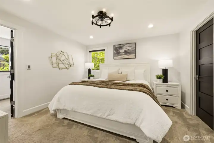 The primary bedroom upstairs has everything you need to retreat at the end of the day, including a walk-in closet and ensuite bathroom