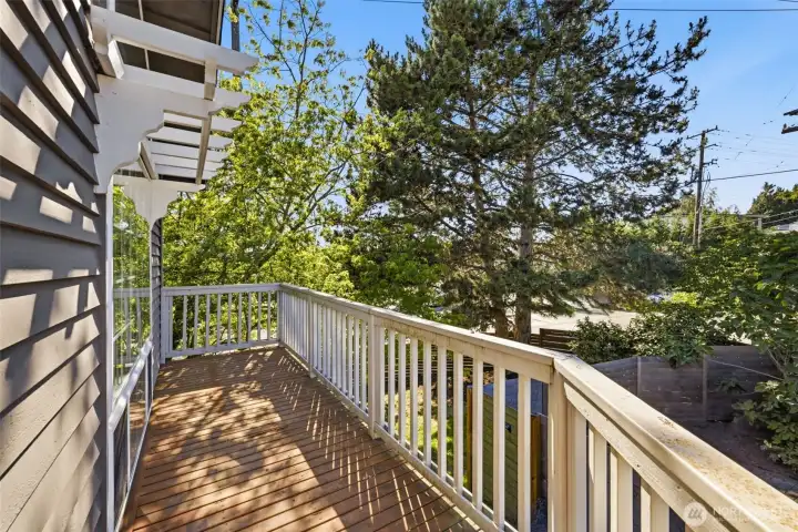 A second deck on the front of the house off of the living room