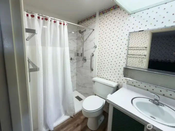Bath with walk in shower Bath with walk in shower