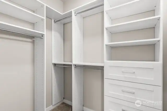 Primary bedroom closet comes with this built-in closet organizer!