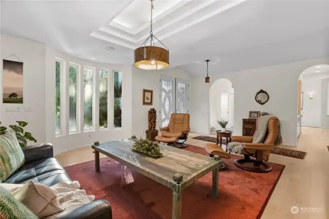 Formal living room off entry with vaulted tray ceilings