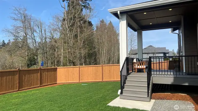Perfect size fenced rearyard, fully fenced and a gorgeous large, covered deck w/metal railing.