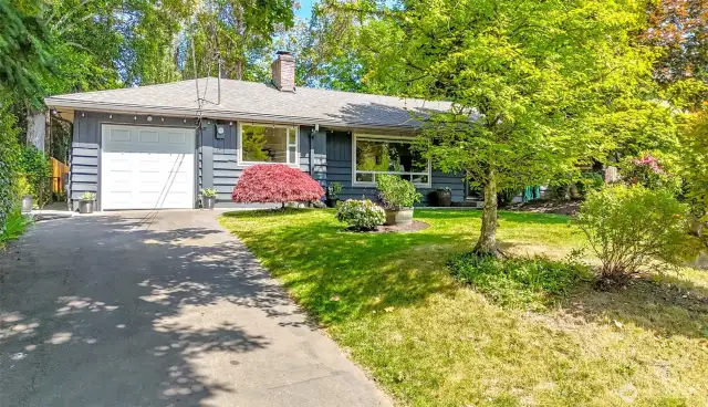Attached Garage, Long Driveway, and Plenty of parking including RV Parking!