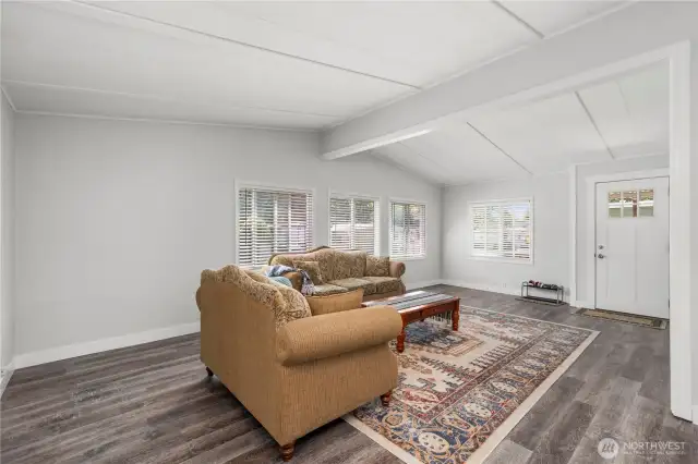 Front door entrance into large living room.
