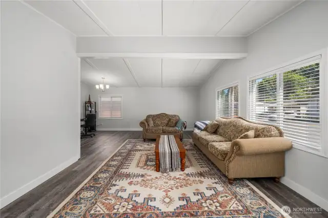 LVP flooring and light and bright walls welcome you inside.