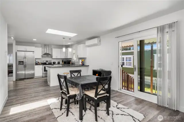 Open concept kitchen and dining for family gatherings or entertaining.