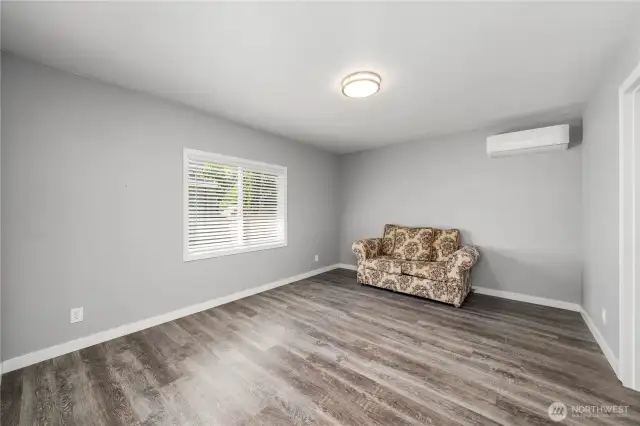 Primary bedroom with mini split to keep cool in the summer or extra warm in the winter.