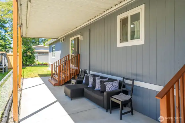 Large patio with cover. Seller will buy outdoor curtains to surround patio with a full price or more offer.