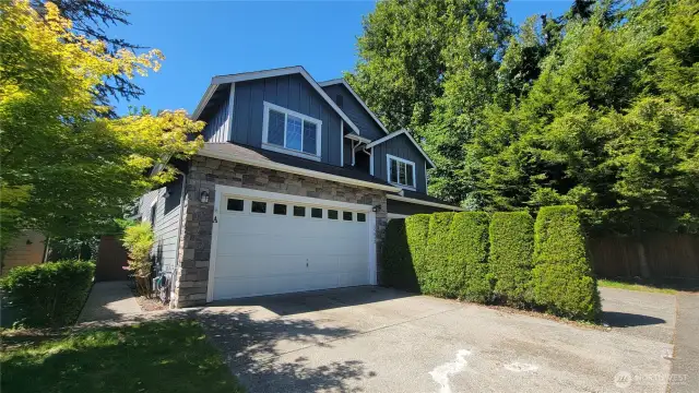 Unit A with 2 car garage and additional driveway parking