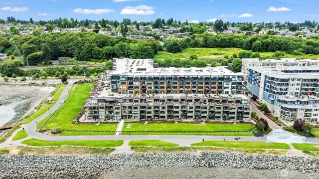 The Rainier building is the last building at this end of the Point Ruston community. The carefree lifestyle means SELLING the mower and never cleaning gutters again!