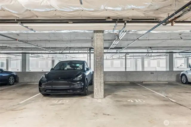 2 Garage Parking spaces included-  The pole between means it becomes a no-knicker!