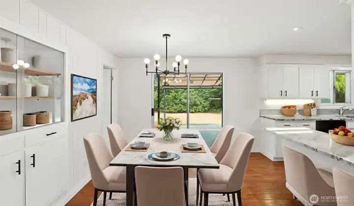 Dining room conveniently accessible from the kitchen and to the backyard! Virtually staged.