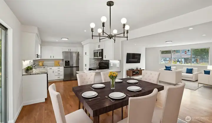 Flow easily from the kitchen to the dining room to the living room. Virtually staged.