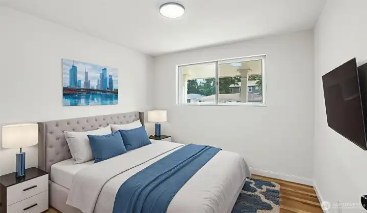 Bedroom #2: 2nd of 3 bedrooms. Virtually staged.
