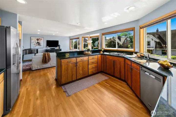 Spacious kitchen opens to the family/TV room.
