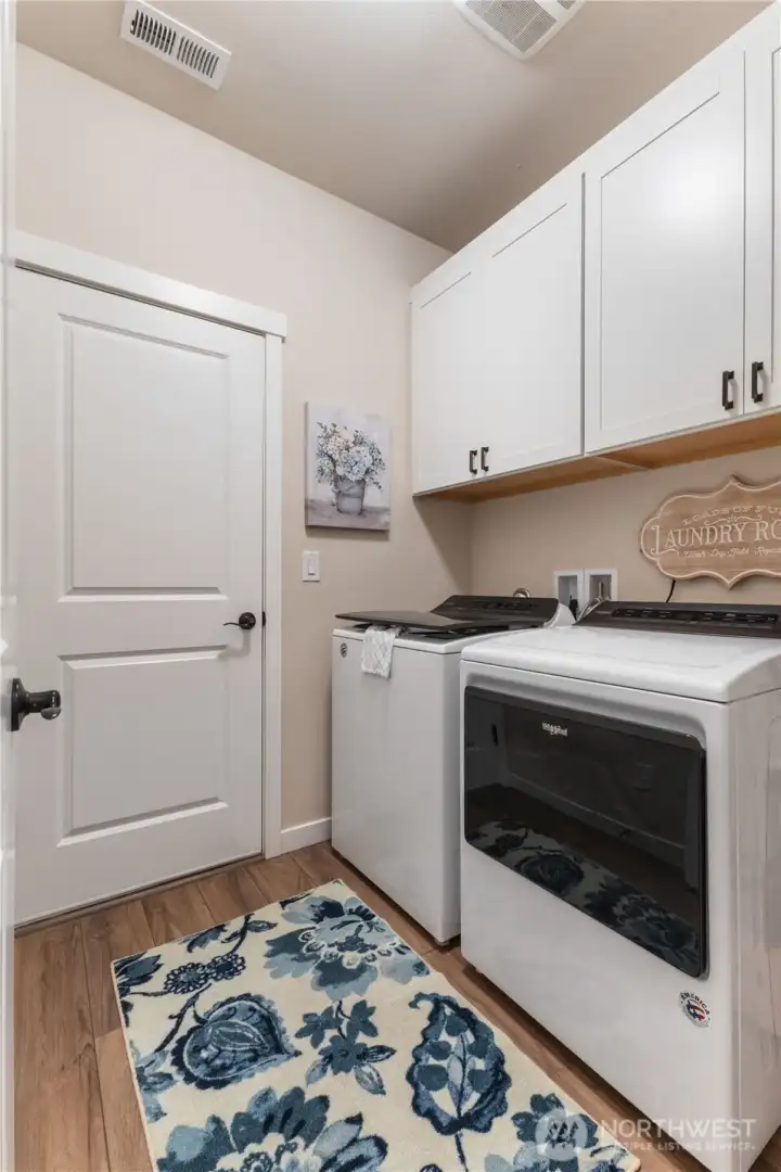 Utility room located directly off the garage.