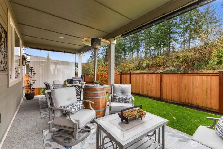 Large covered patio is perfect for relaxation and entertaining.