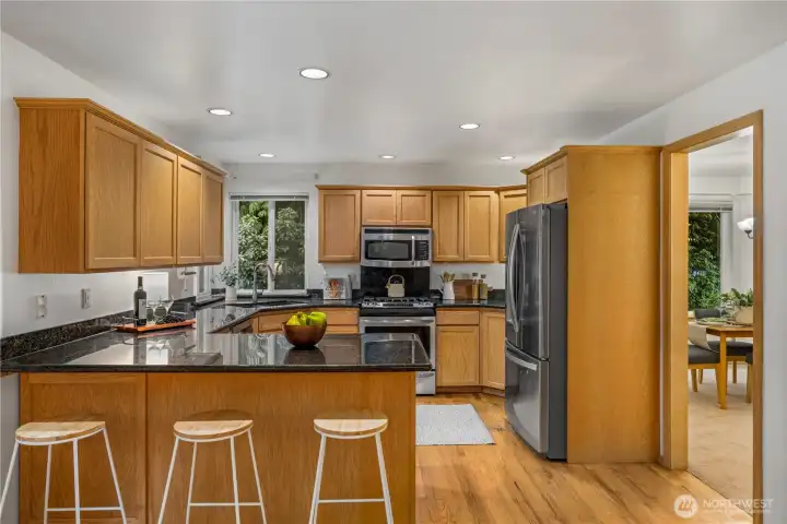Spacious kitchen with granite countertops