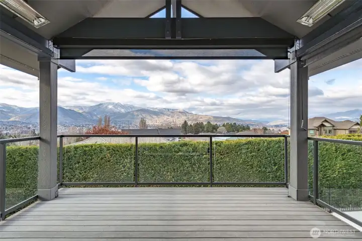 Outdoor living w/ fan, lights, misters & protection