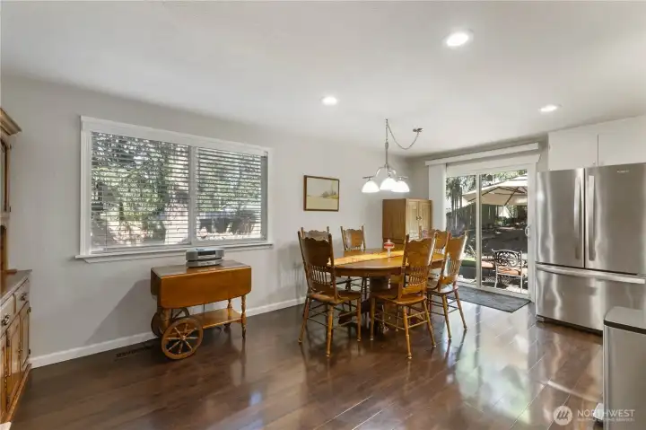 Dining room, and sliding glass door to backyard oasis.