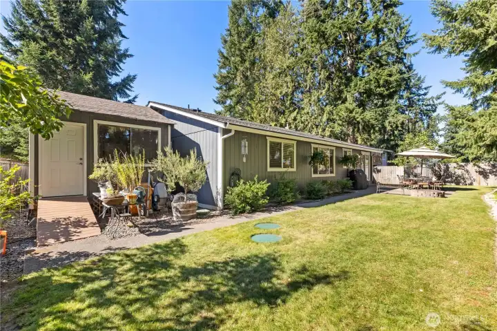 Composite decking ramp goes right into large storage shed to sore lawn equipment, yard tools, or whatever you would like!