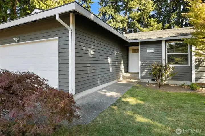 Welcoming walkway to front door.