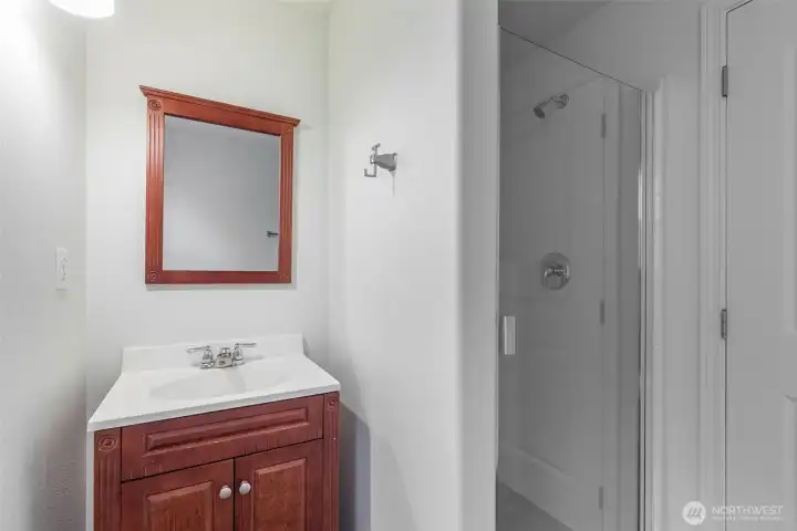 ...and the main level bath with shower.