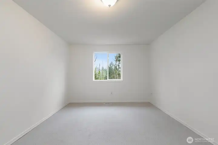 Bedroom #2 on the main level at the end of the hall.