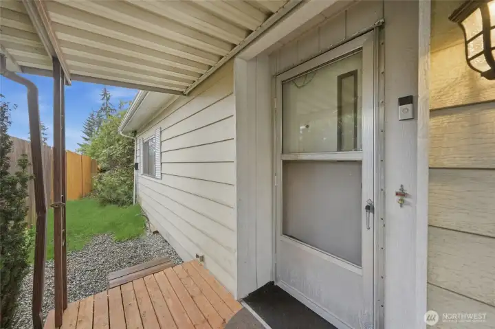 Front door on left side of home