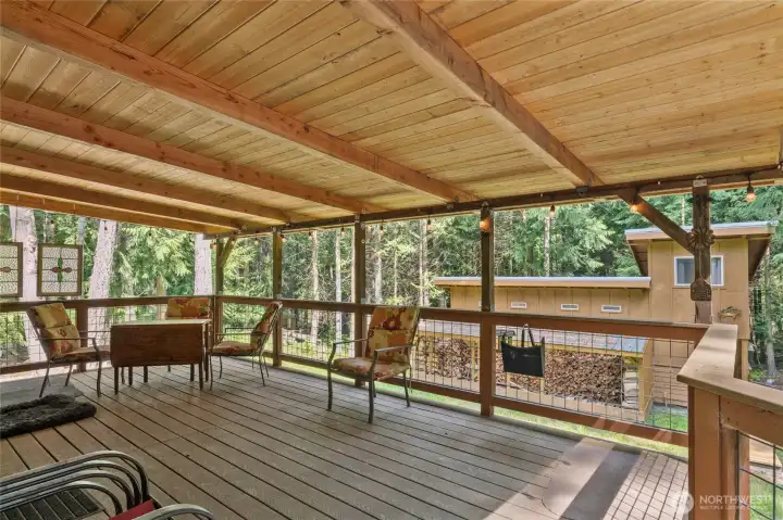 This covered back deck is  gorgeous!
