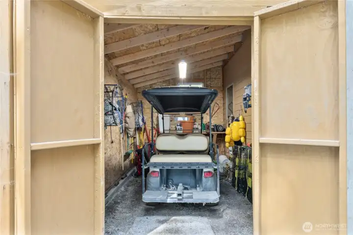 Handy Golf cart garage is attached to the cabin. All vehicles are electric/battery powered. There are a few gas vehicles for rent at the clubhouse if you need to bring large loads up or good, etc.