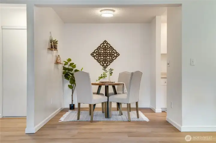 Cozy dining space just off the kitchen—simple and functional.