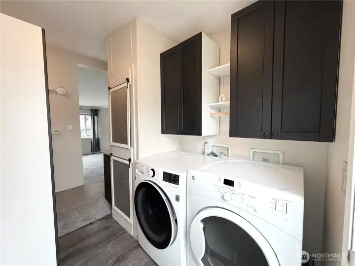 Utility room, with an exit door to side of the house!