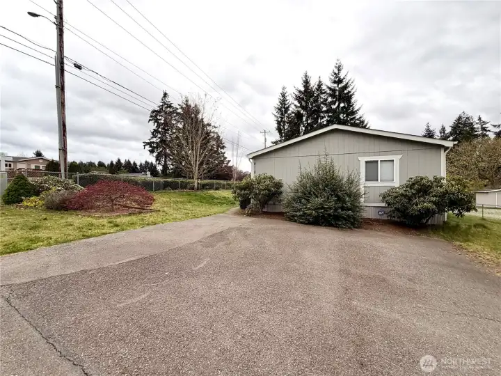 Large corner lot, with plenty of space to make it your own.