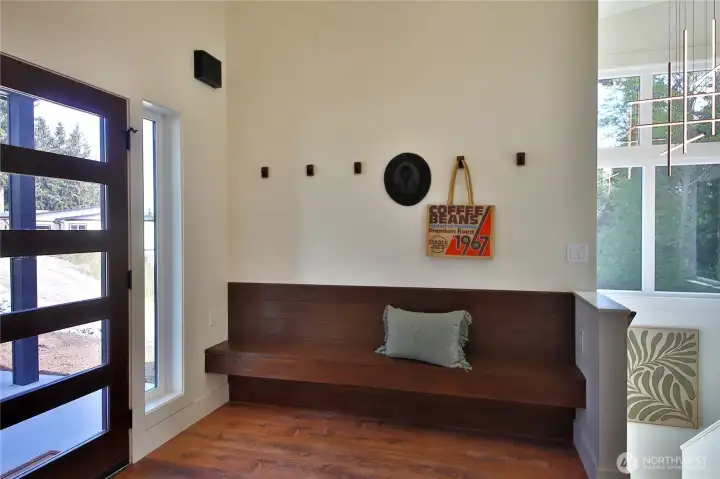 Entering into the Foyer. A place to sit and hang up your jacket.