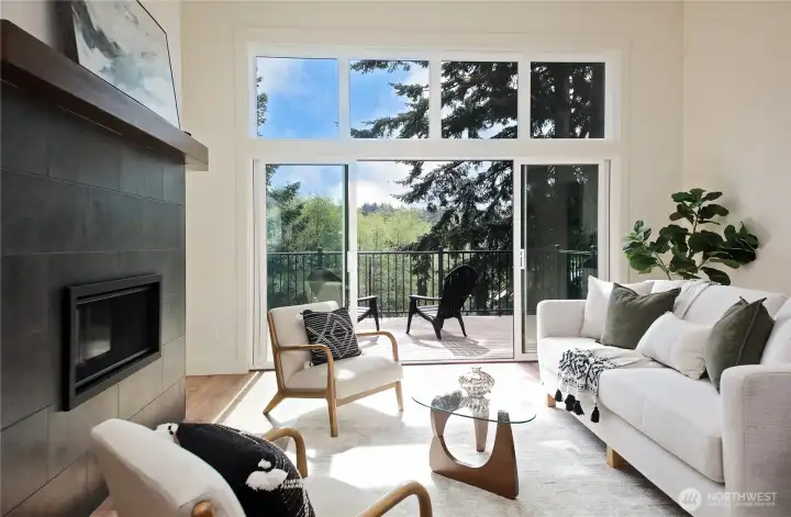 Cozy propane fireplace, and large windows bring the outdoors in.