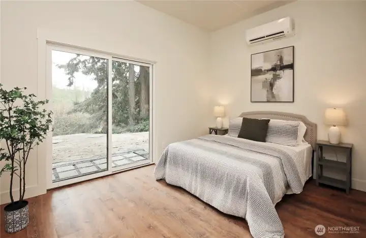 Bedroom 3, with slider to back yard.