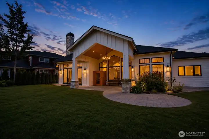Expansive covered outdoor living area designed for year-round entertaining and relaxation.