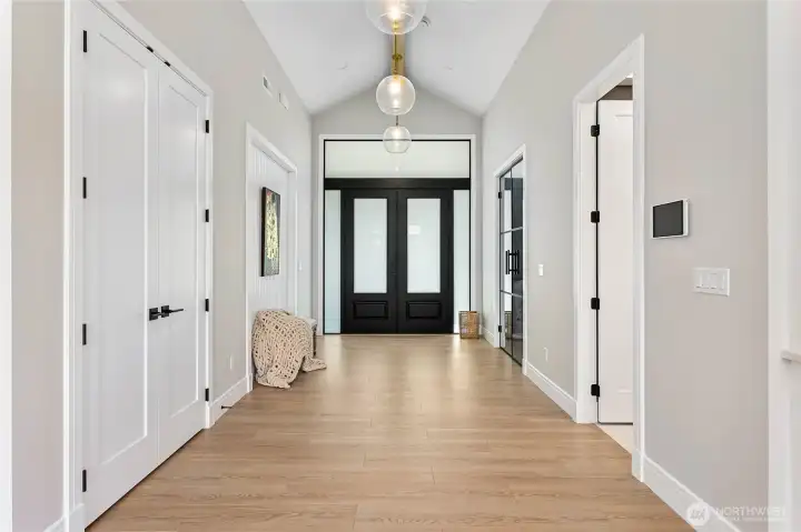 Entry to the home, storage space on entry, office on the right, with bathroom space no the right. Ipad has sound system that can be played.