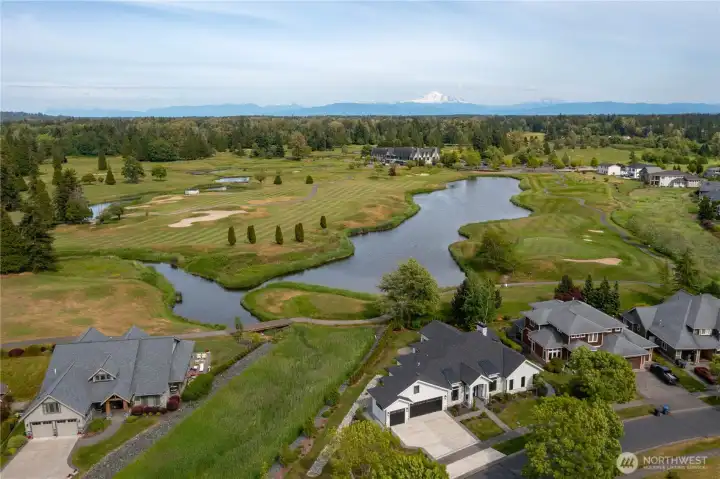 • Elevated aerial perspective highlighting the home's exceptional location within The Greens at Loomis Trail.